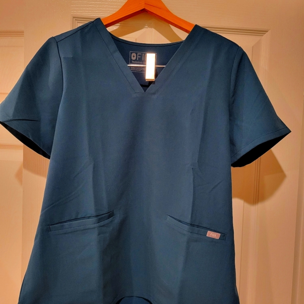 Figs scrub tops. 2 available.  Medium and Large. Caribbean Blue.